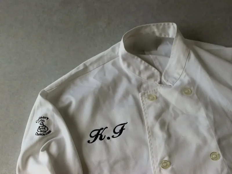 White chef coat with embroidered initials