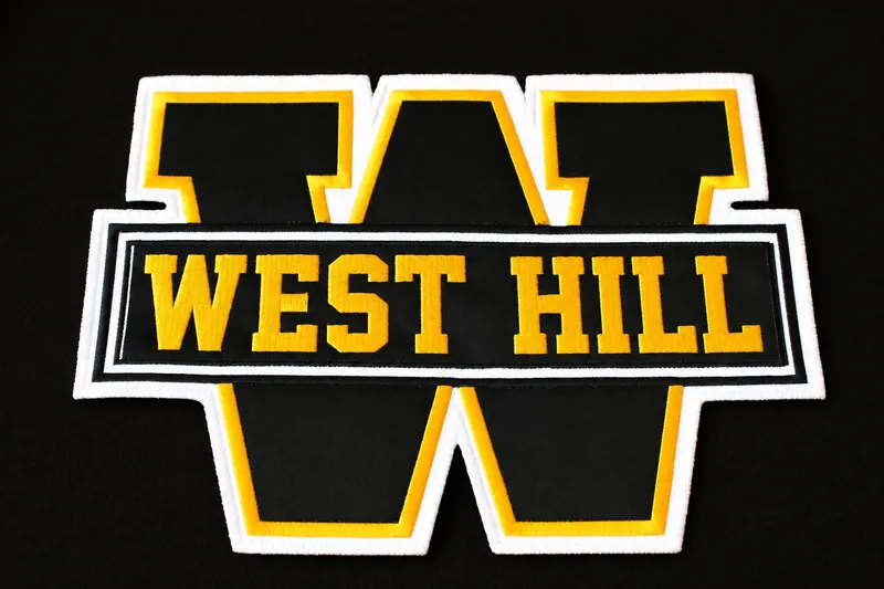 Black and gold twill letter patch